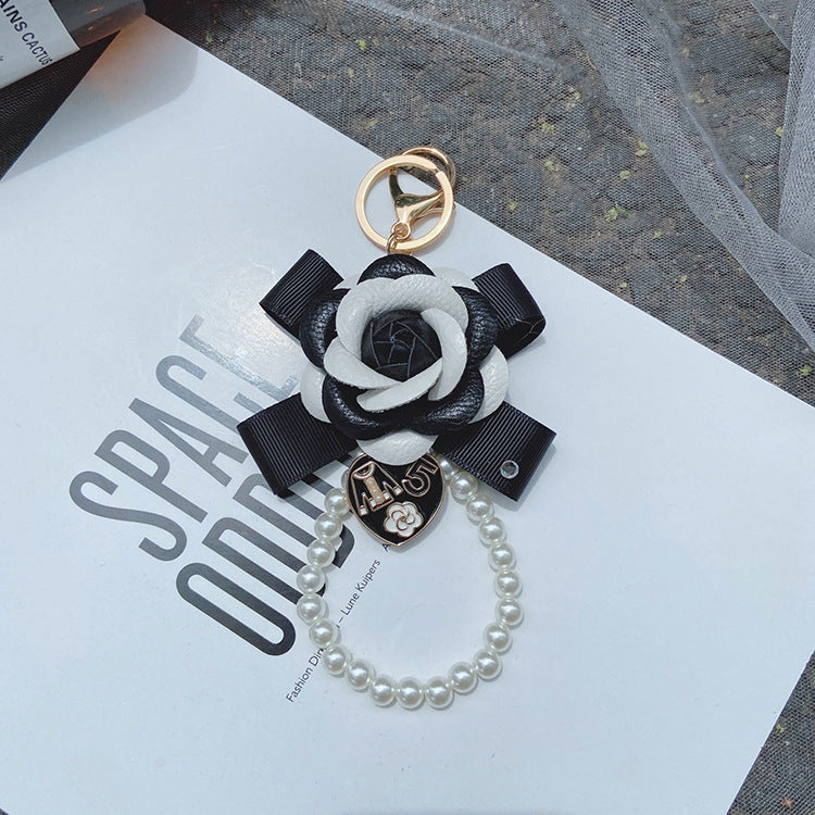 Wholesale PU Bow Camellia Keychain